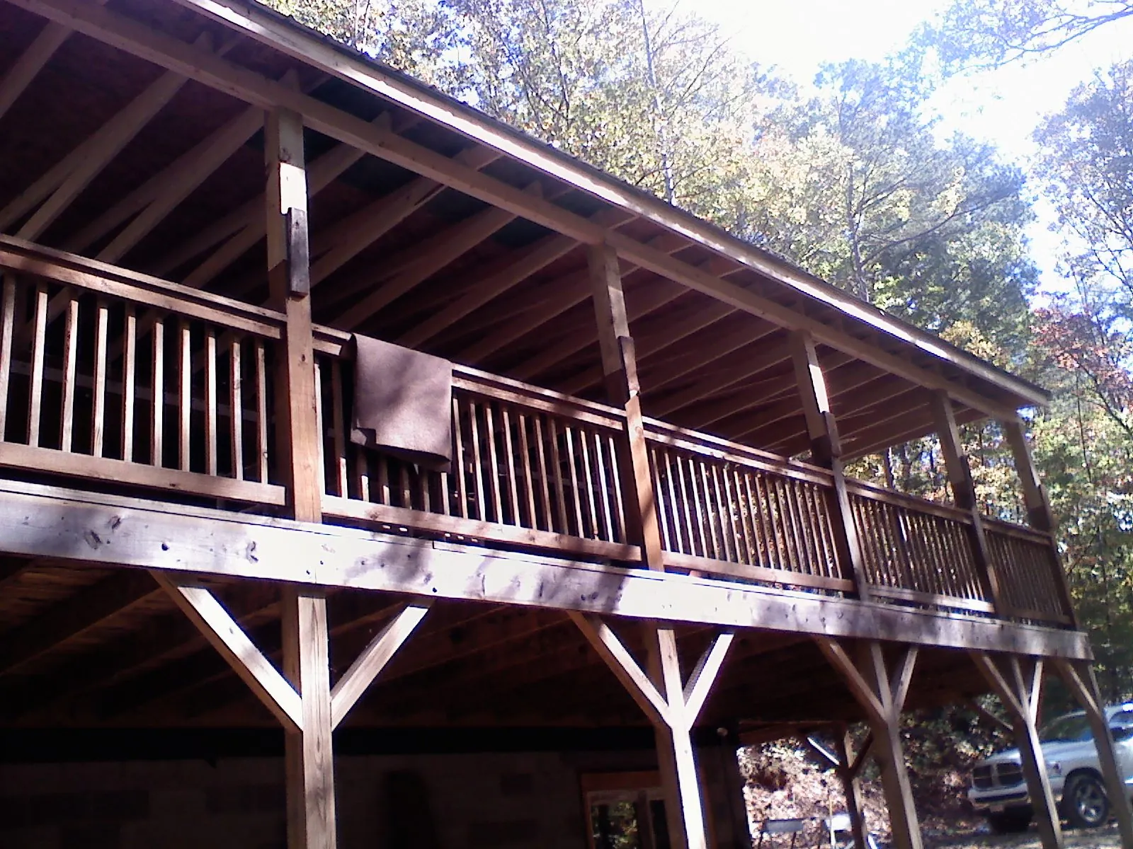 Timber framing under a new elevated porch and deck — Roof Leak Repair in Aspen by Roofing Brothers
